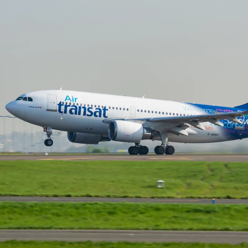 Air Transat flight taking off in a large air