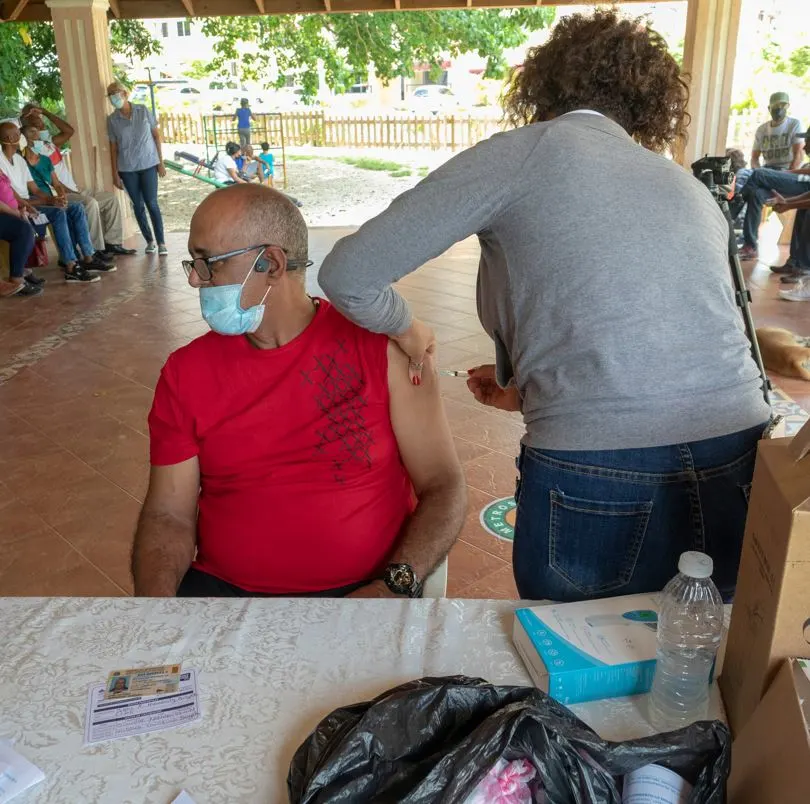 Dominican Man Getting Vaccine 