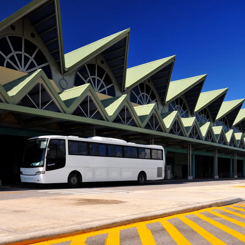 Dominican Airport with bus waiting for tourists
