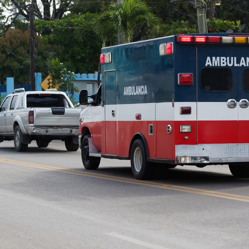 Dominican ambulance on the road carrying patients 