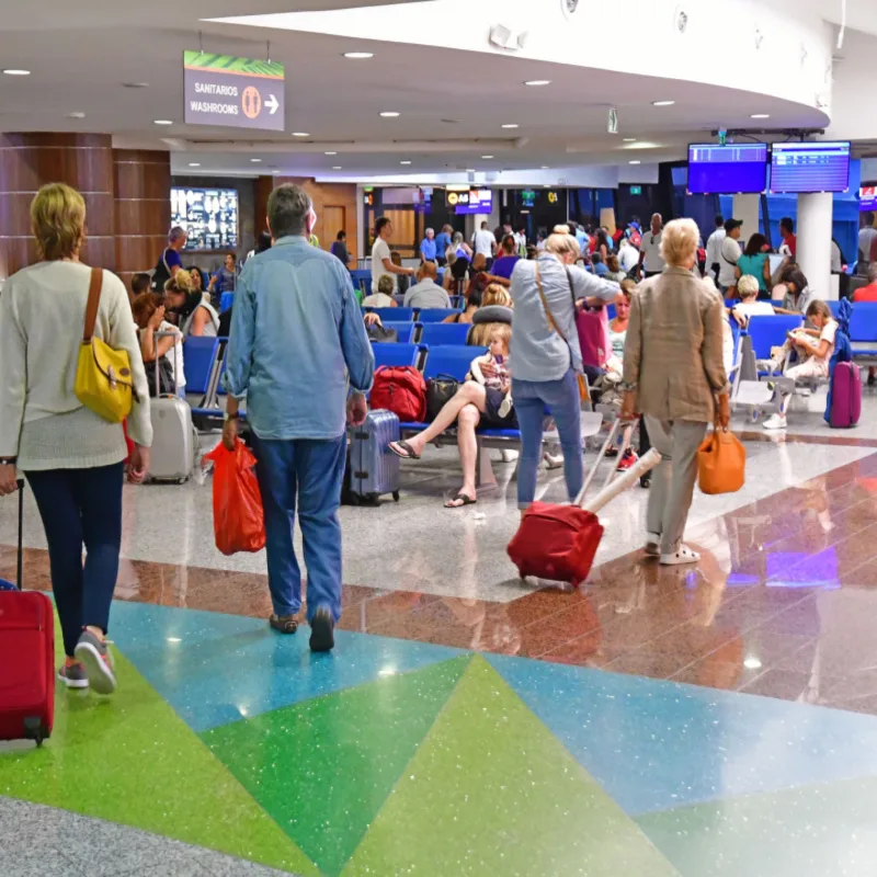 Airport passengers walking in punta cana airport