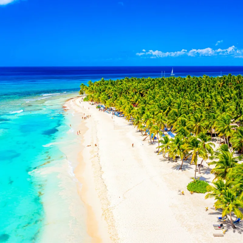 Bávaro beach with tropical turquoise water and sun, Dominican Republic