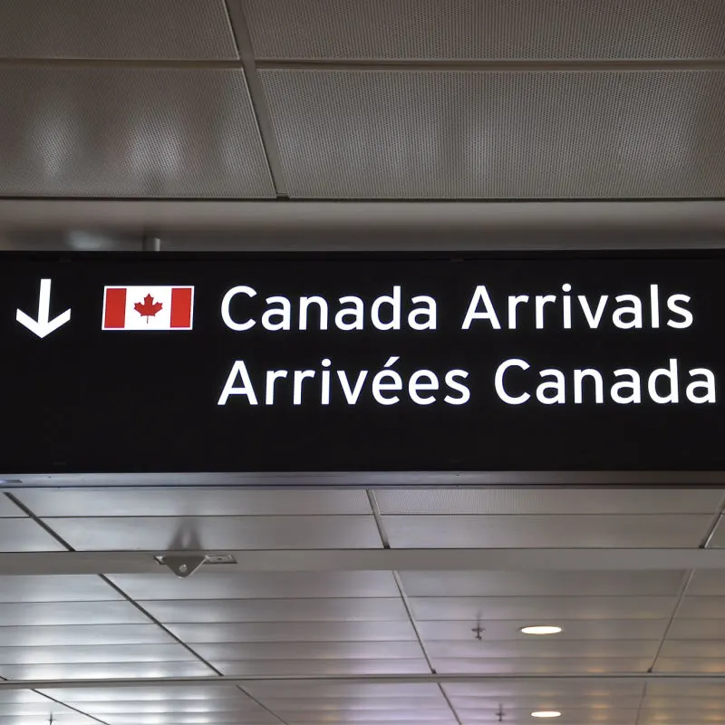 Canada Arrivals sign in an airport
