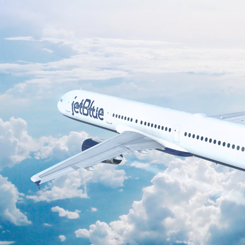 JetBlue flight above the clouds