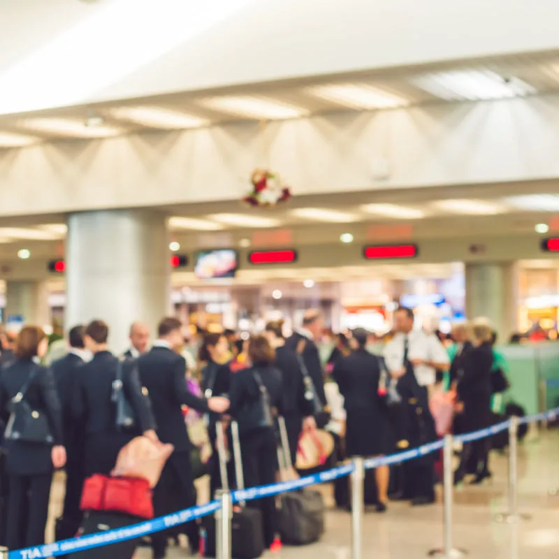 Line at airport security with Christmas decoration