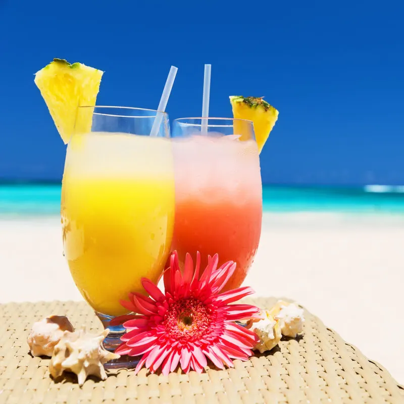 Colourful tropical drinks on a Caribbean beach