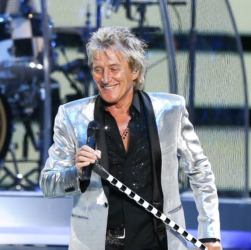 Rod Stewart on stage in silver jacket