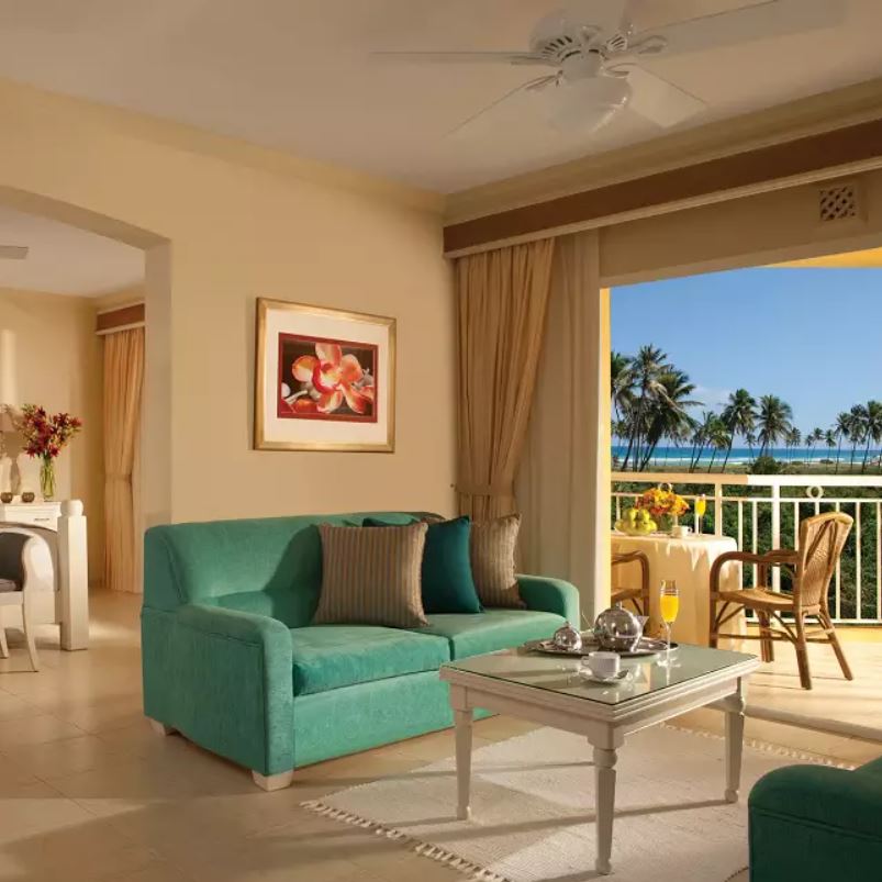 Room with couch and open doors out to ocean in punta cana Jewel resort