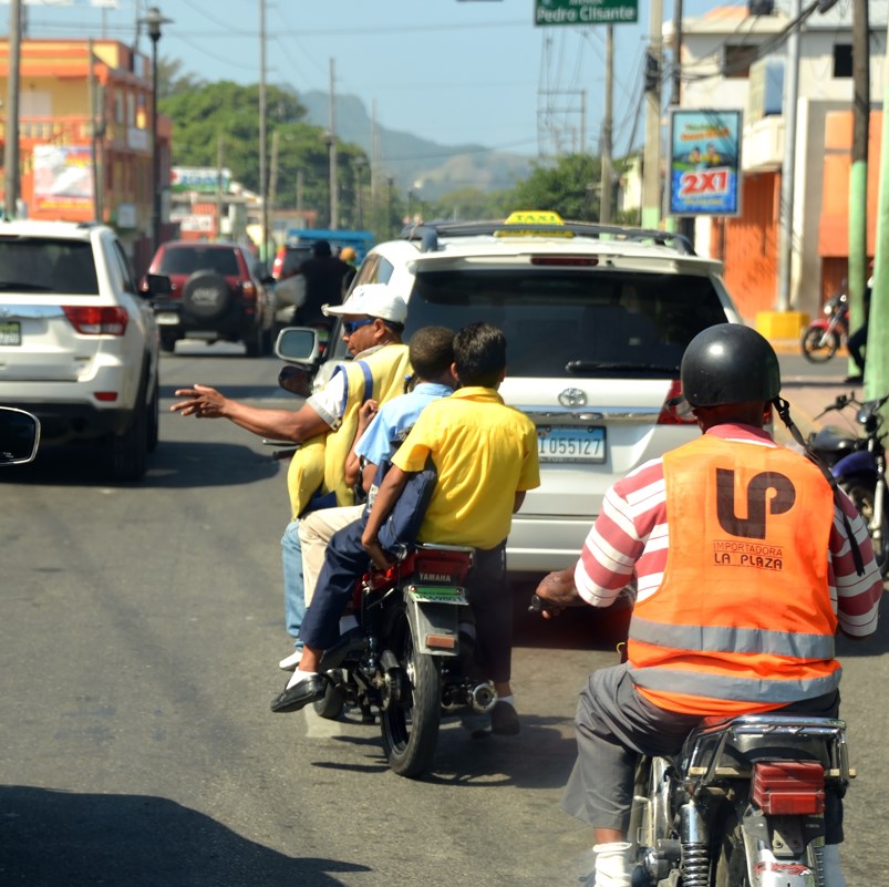 drivers on a busy road near punta cana