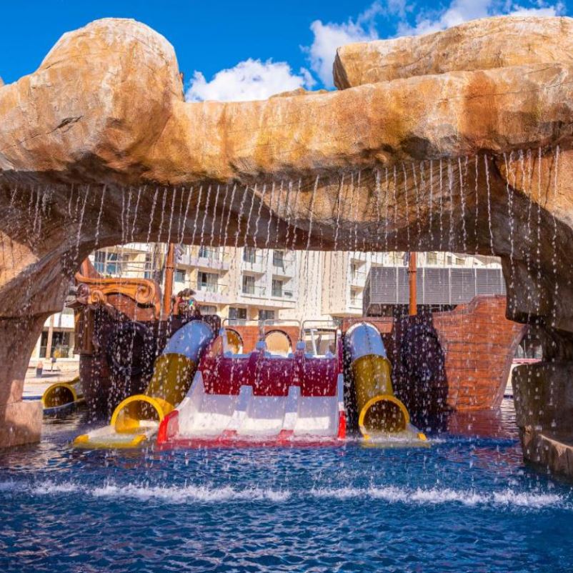 Planet Hollywood Cancun pool with waterslides and waterfall