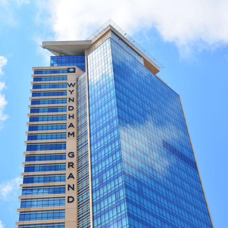 A modern hotel high-rise with a glass facade 