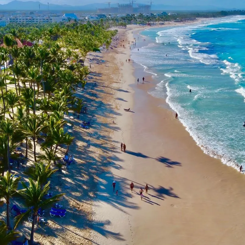 Punta Cana aerial view of beach and people walking