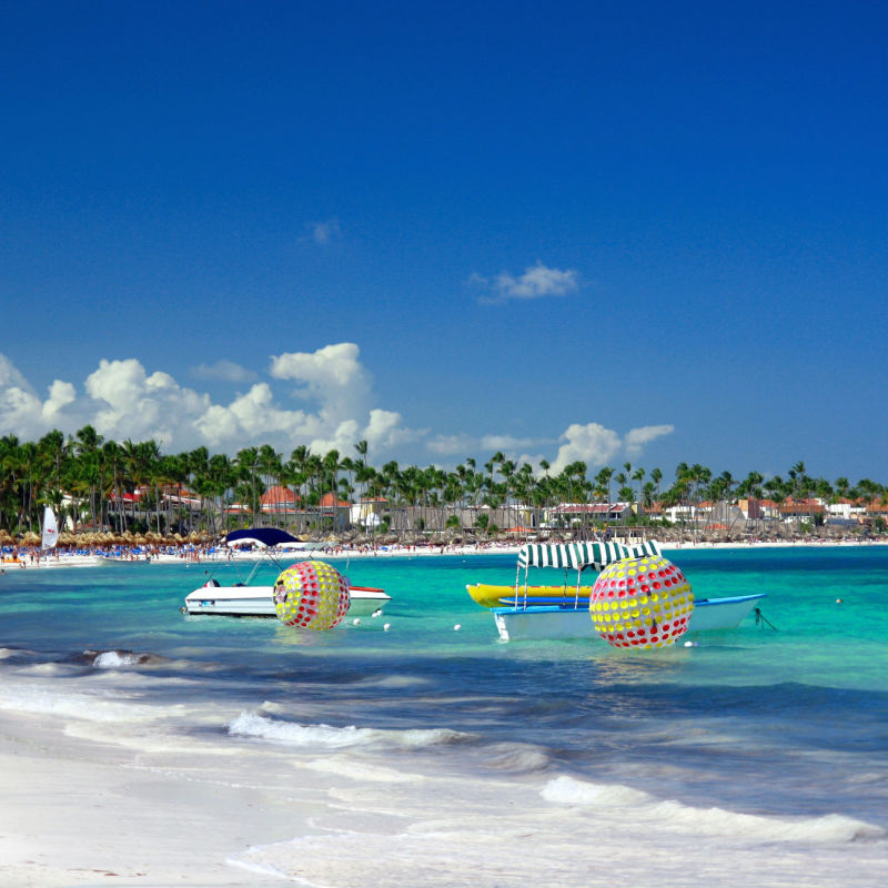 Tropical water and small boats in Punta Cana 