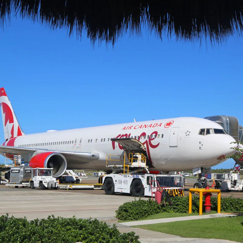 Aircraft parked outside of Punta Cana airport terminal 