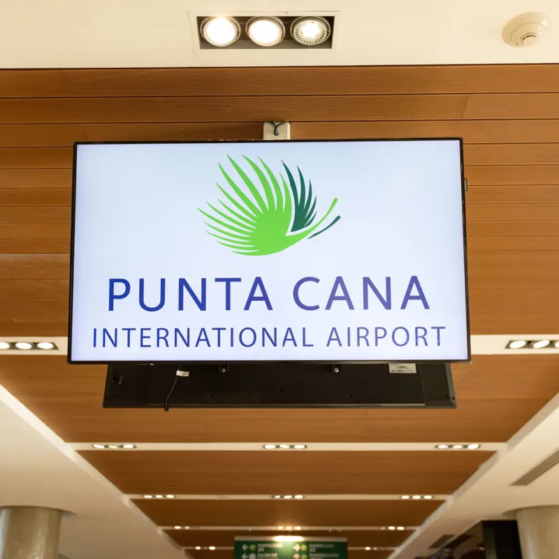 Punta Cana International Airport sign with wood ceiling