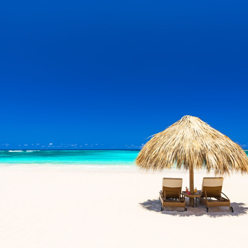 A white sand beach in Punta Cana with blue sky 