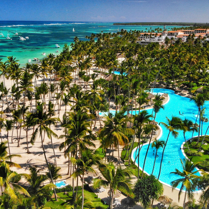 Pool and palm trees in a Punta Cana resort area