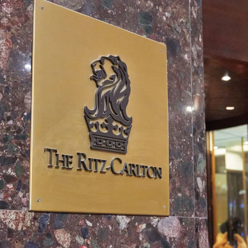 Ritz Carlton logo on a column in a hotel 