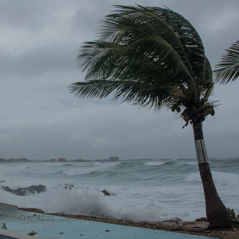 strong winds causing large waves and rain