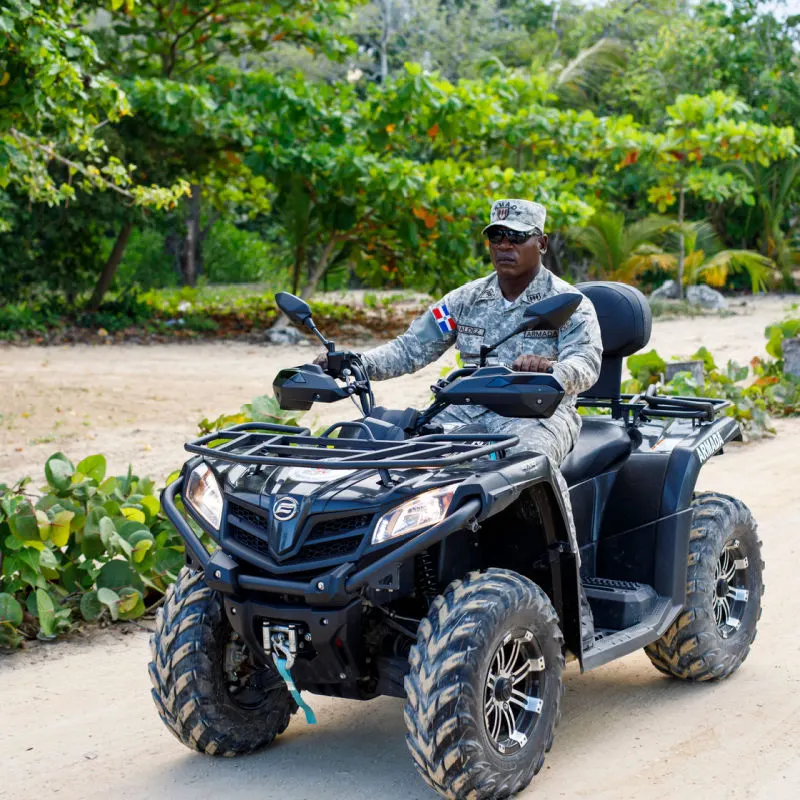 Armed officer on small vehicle in Punta Cana 