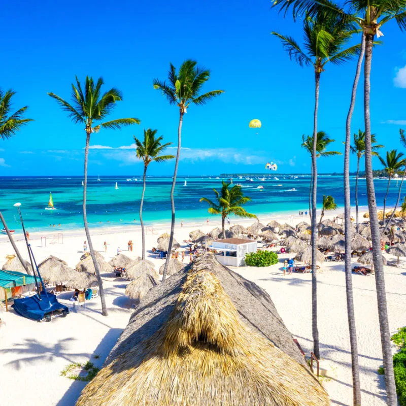 A white sand beach with travelers in Punta Cana