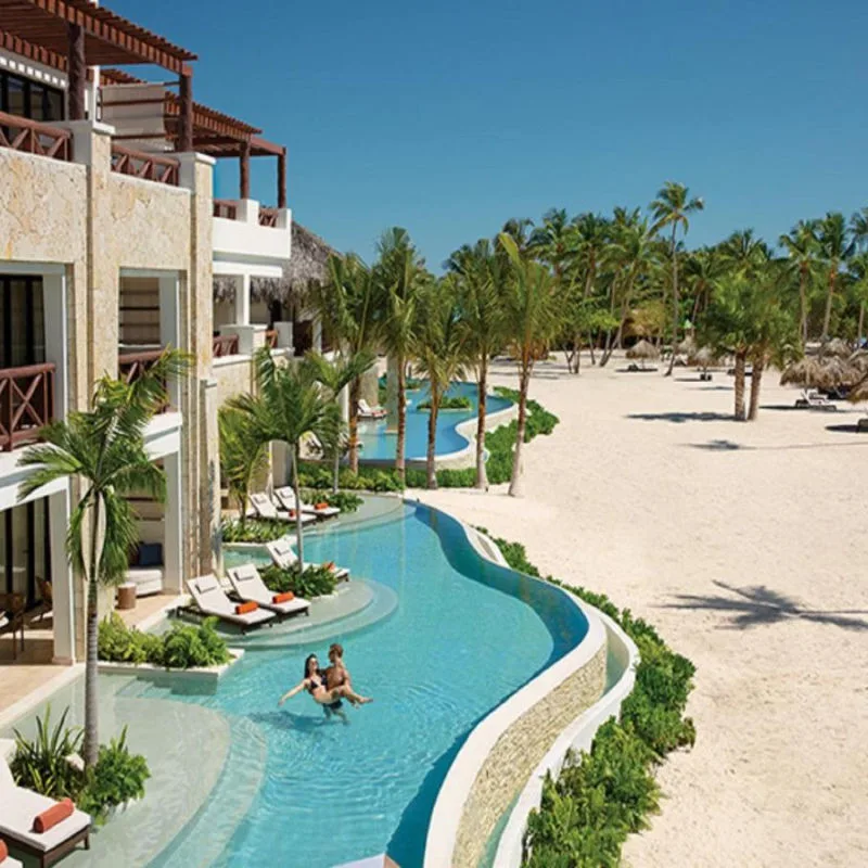 Outdoor pool area in Secrets Cap Cana