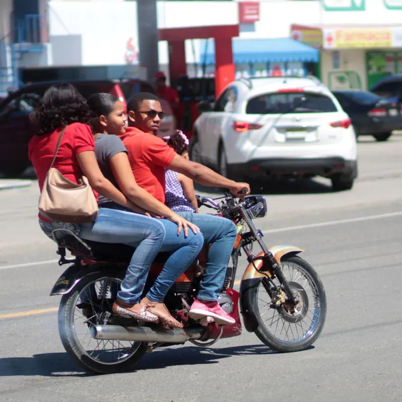 Motorbike in Punta Cana with three people on it