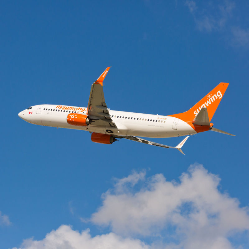 A Sunwing Airline flight mid-flight in the Dominican Republic 