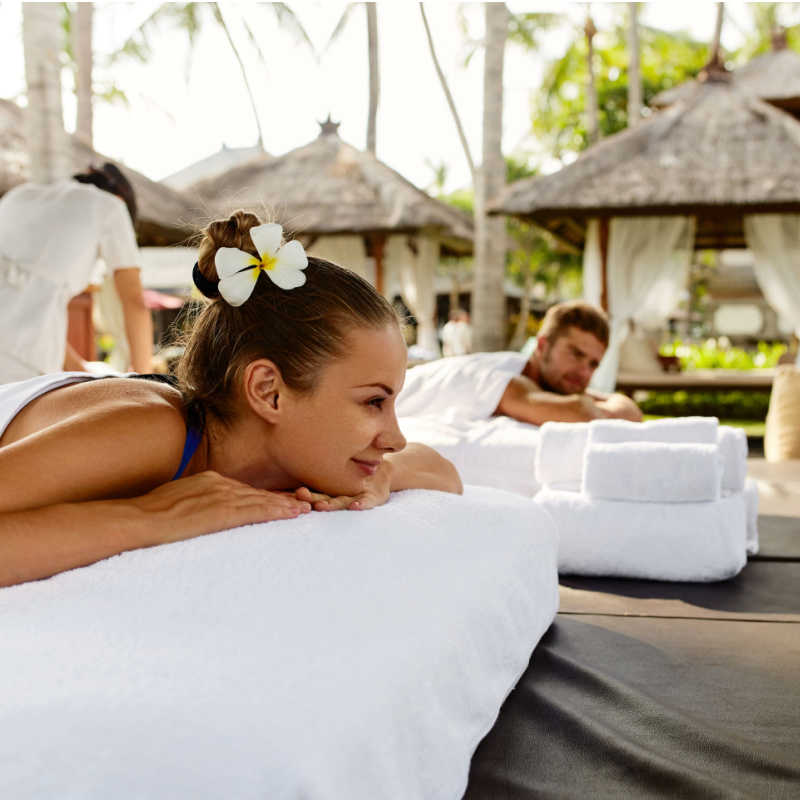 a couple receiving a relaxing massage in punta cana