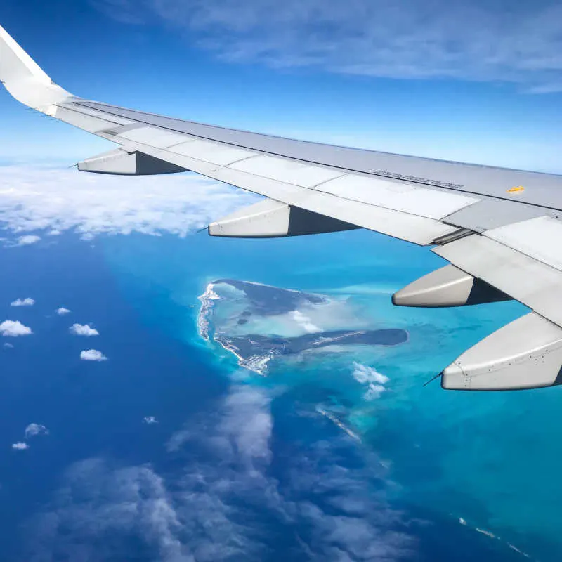 an airplane over the caribbean sea 