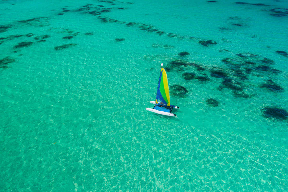 a sailboat in Punta Cana amid turquoise water
